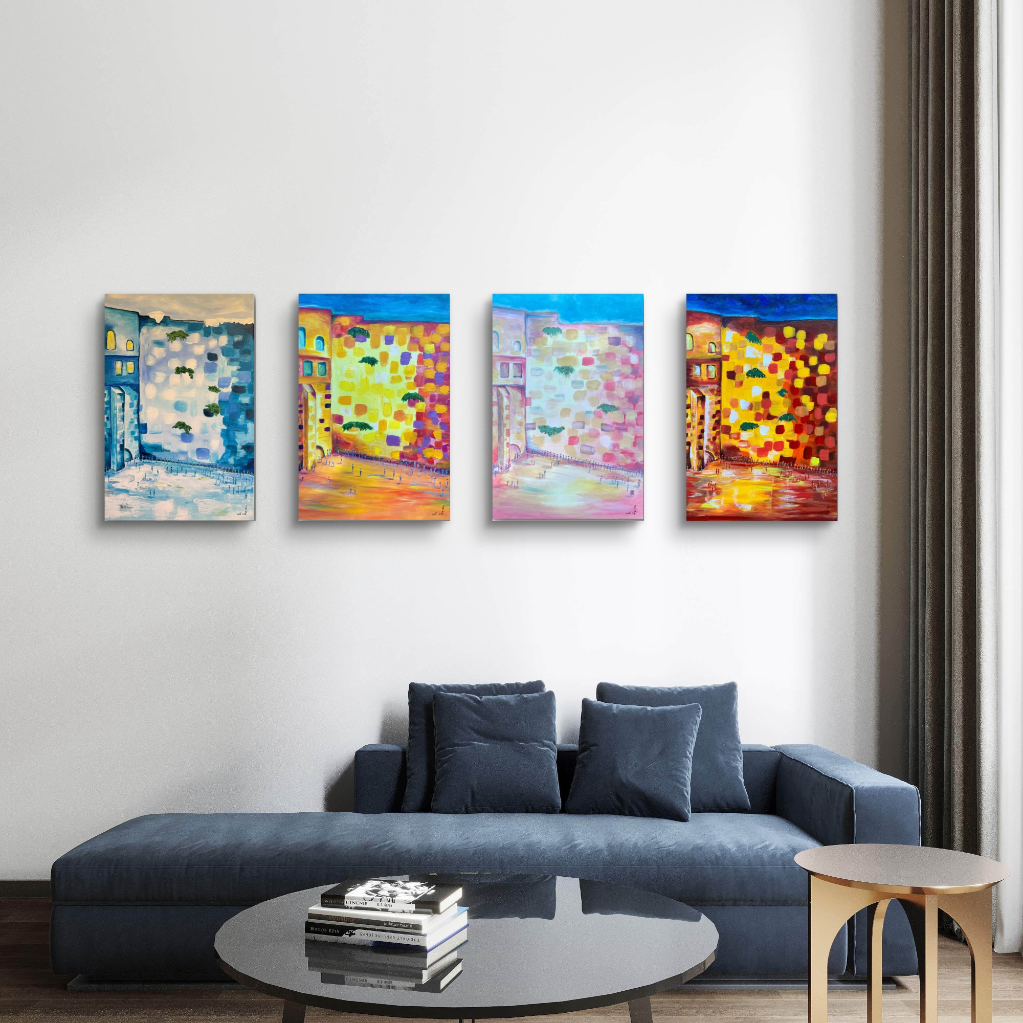 Four colorful paintings displayed above a sofa